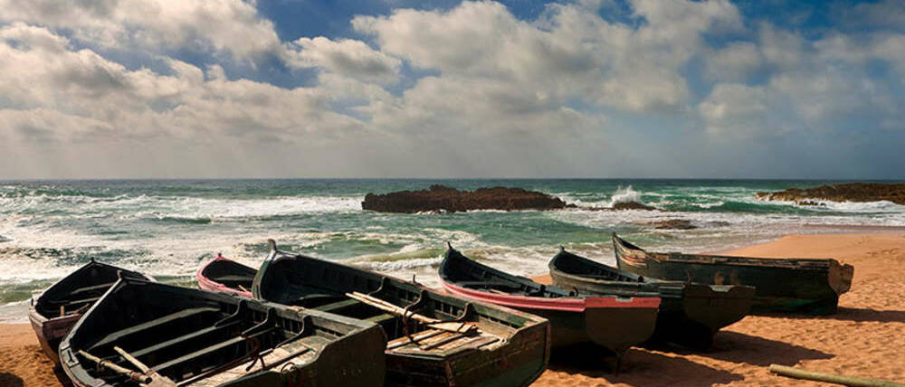 Séjour au Maroc bateaux sur la plage de Oualidia